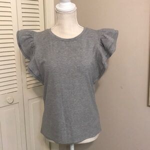 Women’s ruffle edged short sleeve top.
